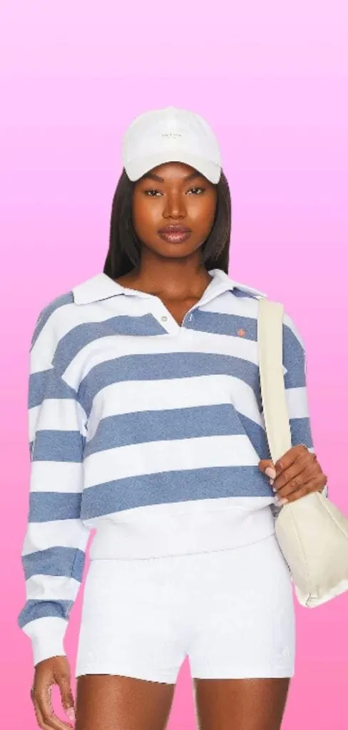 blue striped polo and cap