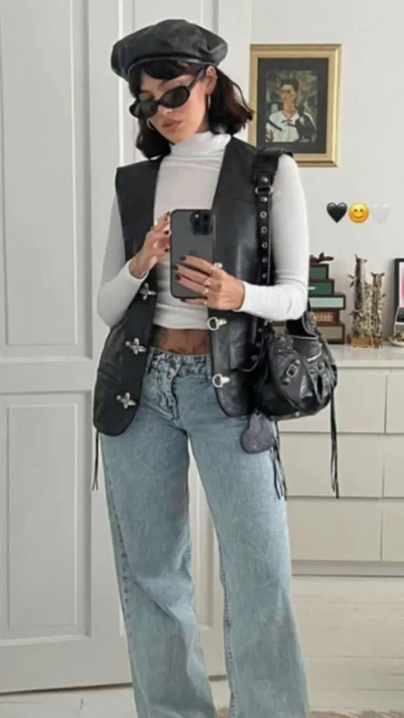 Leather vest look with a beret