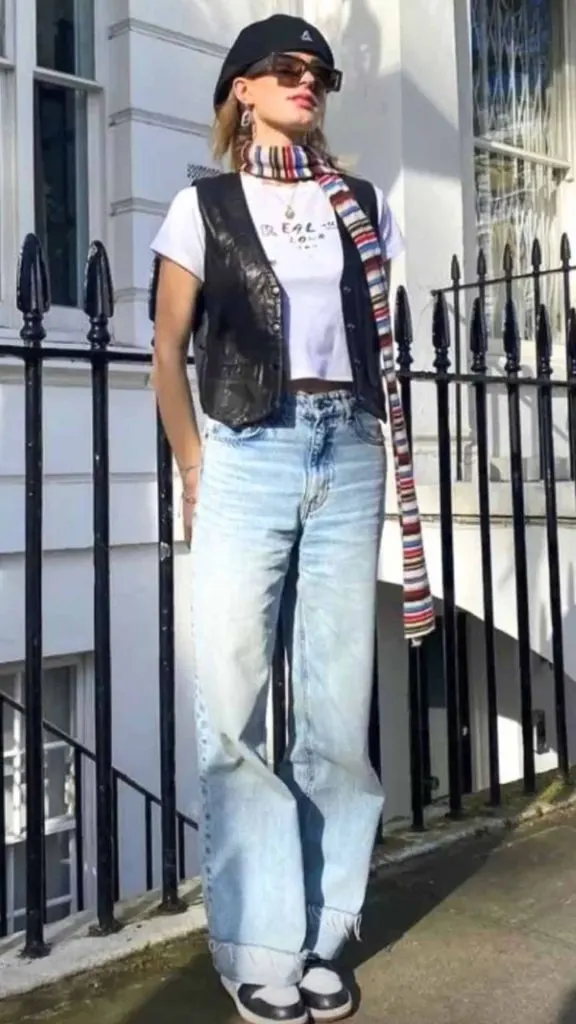 Leather vest look with a beret