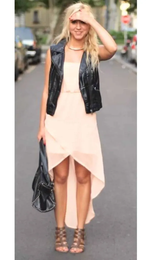 black leather vest and pink dress