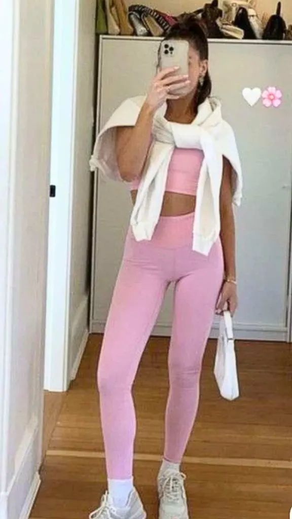 pink gym set with white cardigan