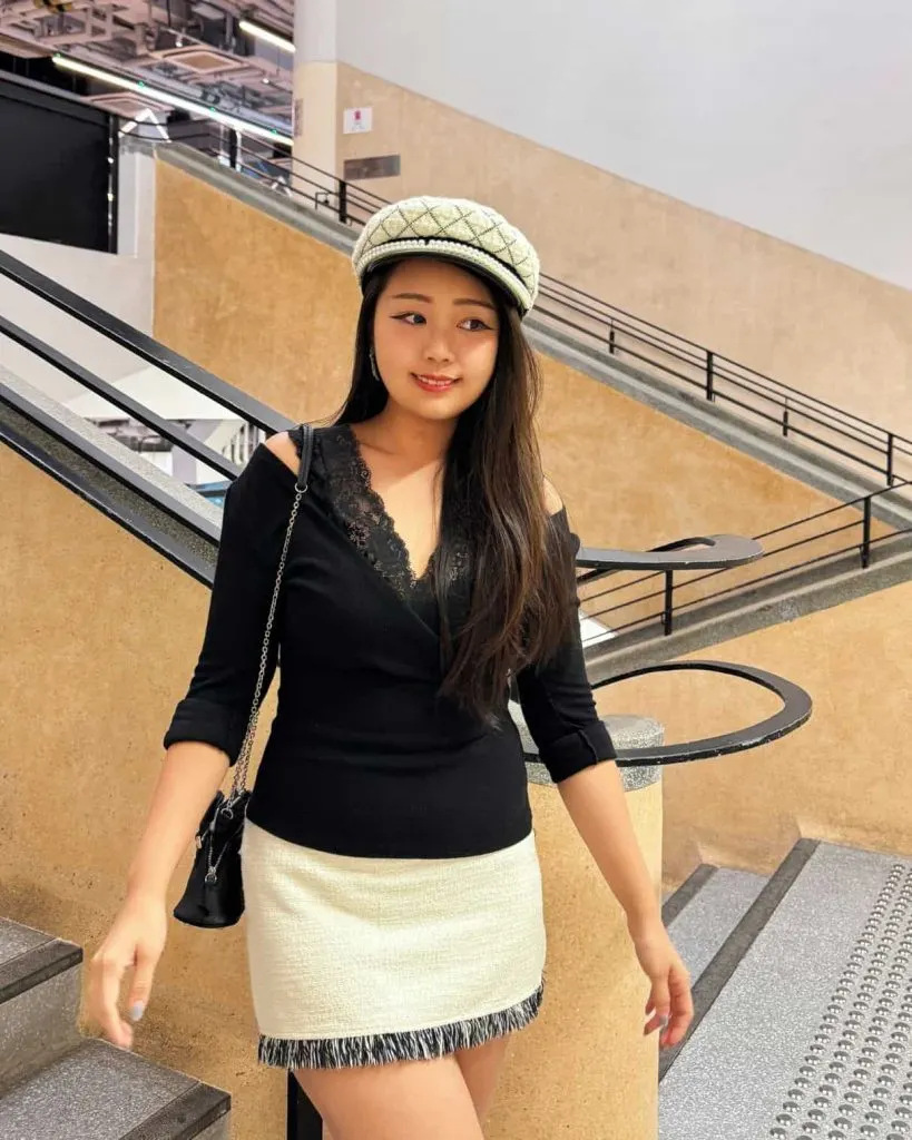 black lace top and white tweed skirt