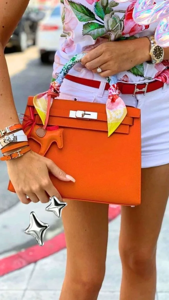 orange hermes bag outfit