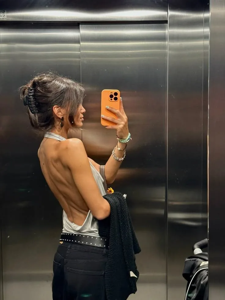 open back top outfit hairstyle