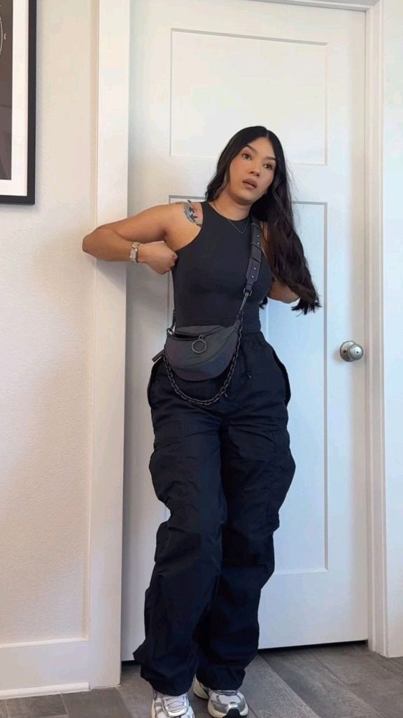 monotone cargo pants outfit with slingbag
