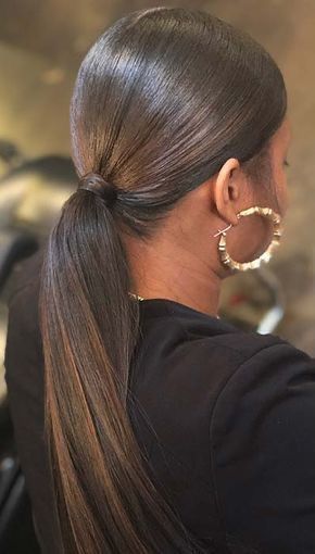 slicked-back low ponytail